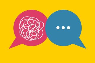 Two speech bubbles, one full of a tangle of string and the other with three simple dots.